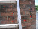 An exterior chimney inspection reveals missing mortar